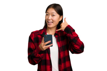 Young asian woman holding a mobile phone isolated
