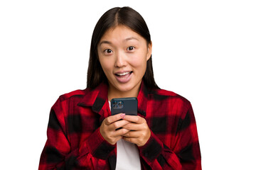 Young asian woman holding a mobile phone isolated