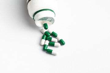 Medical pills on white background with copy space