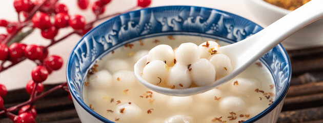 Little white tangyuan with sweet osmanthus honey and syrup soup.