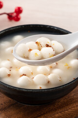 Little white tangyuan with sweet osmanthus honey and syrup soup.