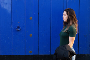 Young woman visiting the streets of Sanlucar de Barrameda