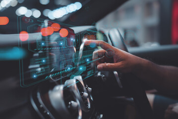 graphic user interface and a futuristic car (GUI). intelligent vehicle connected vehicle The...