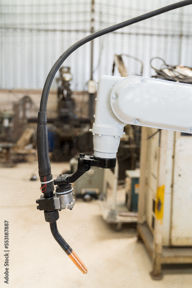 Aufkleber close-up of automatic robot arm system welding machine in the industry factory. industry robot manuf