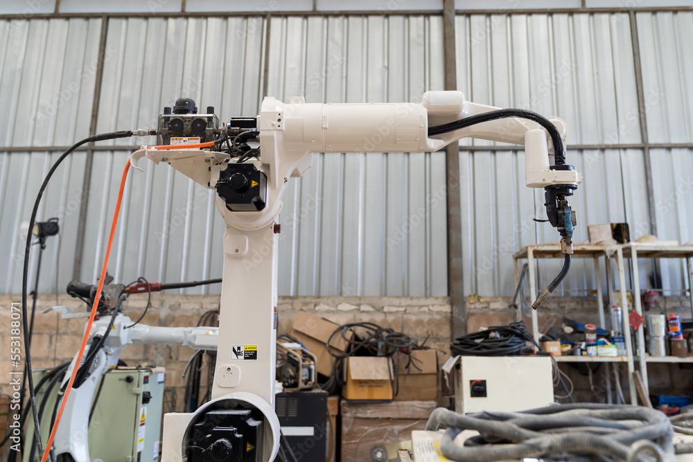 Poster Automatic robot arm system welding machine in the industry factory. Industry robot manufacturing technology