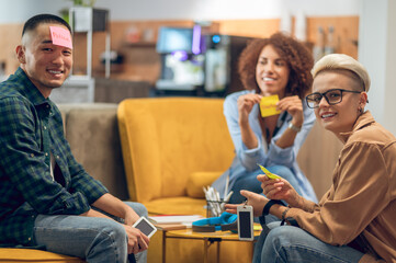 Company of office employees enjoying their leisure activity