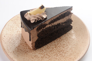 Chocolate pastry with chocolate fudge topping and frosting
