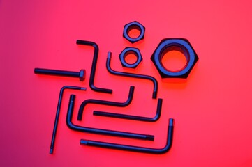 hexagons for furniture assembly on a red background.Close-up