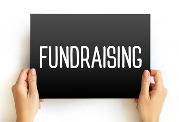 Fundraising - process of seeking and gathering voluntary financial contributions, text concept on...