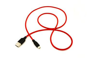 Red USB cable for smartphone isolated on white background.	