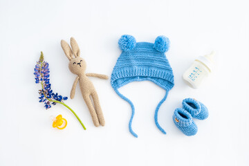 Baby boy blue hat with booties and accessories, top view