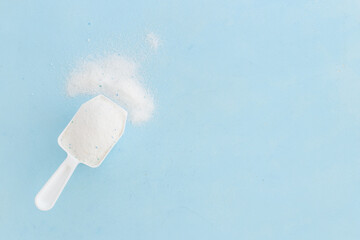 White laundry detergents powder with cup for laundry