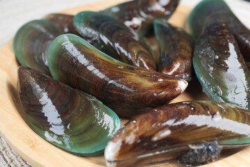 Thai mussels in metal on table top view 