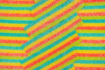 Assorted colorful gummy candies. Top view. Jelly donuts. Jelly bears. Isolated on a white background.