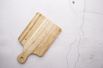 wooden chopping board on white background top down 