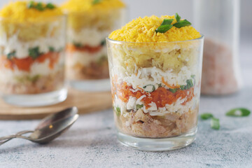 Mimosa salad in transparent glass	