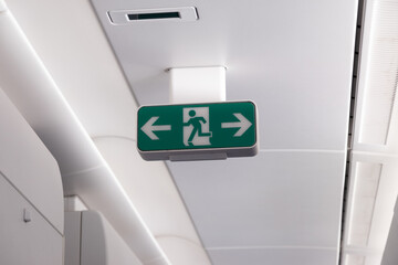 The emergency exit symbol show the escape way to leave the aircraft when emergency.