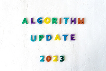Algorithm update 2023 colorful sign on white background. SEO term for search engine algorithm...
