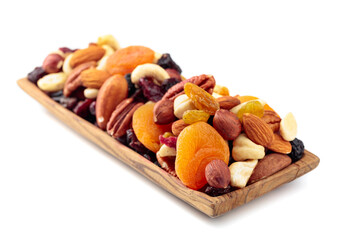 Fototapeta na wymiar Mix of nuts and dried fruits isolated on a white background.