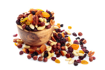 Mix of nuts and dried fruits isolated on a white background.