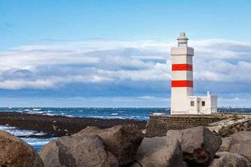 Lighthouse on the coast of Icelandic sea, Iceland