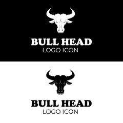 Bull head with big horn and angry face for retro vintage ranch farm logo design