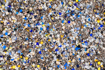 Yellow and blue confetti scattered on the ground. Victory for Ukraine, peace, no war. - obrazy, fototapety, plakaty