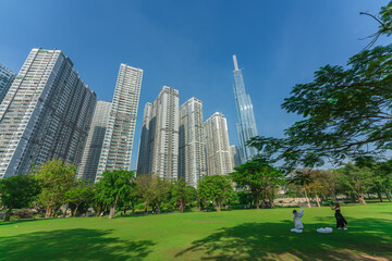 Landmark 81, skyscrapers viewed from below towards sky represents urban development with modern architecture. Combined with Vinhomes Central Park Project