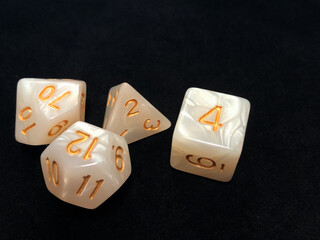 role-playing RPG dice on a black felt background