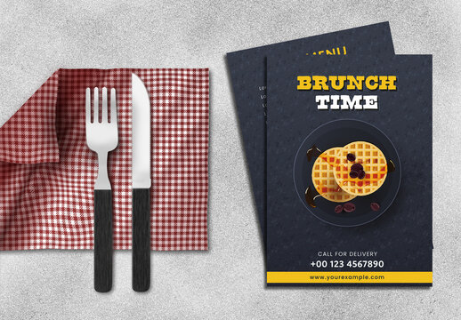 Brunch time menu card templates with top view of waffle, knife, fork, cloth napkin on grey background