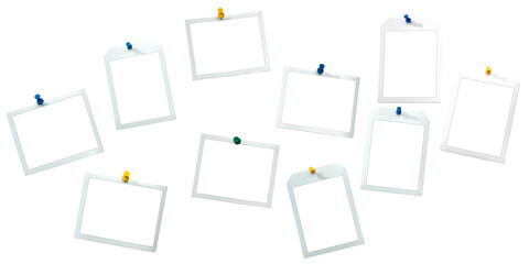 Instant frames hang on wall with colored pins. Isolated on White with clipping path