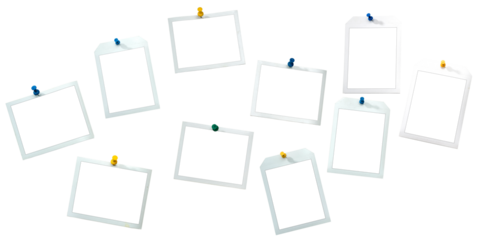 Instant frames hang on wall with colored pins. Isolated on White with clipping path