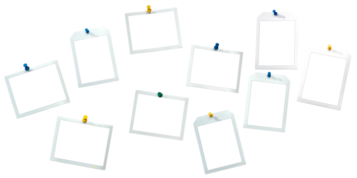 Instant frames hang on wall with colored pins. Isolated on White with clipping path