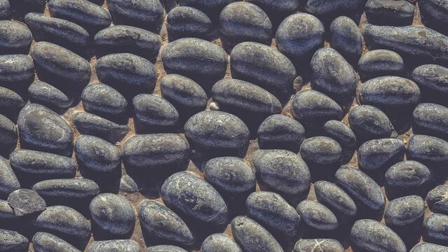 Lot of white masonry cladding pebble texture seamless loop. Stones pattern background.