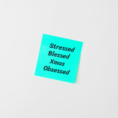 Stressed Blessed Christmas Obsessed funny phrase written on memo sticker