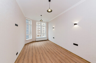 Fototapeta premium Empty room after renovation with two windows