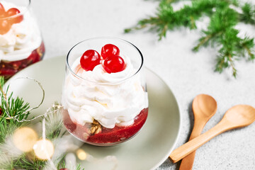 Cranberry granola parfait for xmas healthy dessert idea. Greek yogurt with granola and jam for christmas healthy breakfast.