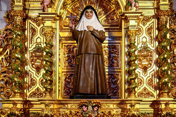 Religious saint statue in Almudena Cathedral, Madrid, Spain