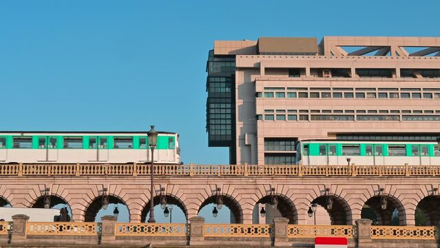 Two Subway Trains crossing the River Seine on the Bercy Bridge, Paris, France.