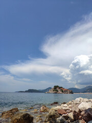 Beautiful view from the rocky beach on Sveti Stefan island in Montenegro