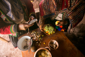 Cooking a traditional Andean vegetable soup before a Pachamanca feast with a Quechua tribe in the...