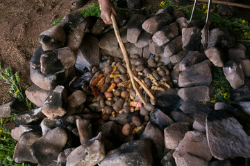 Variety of Peruvian potatoes. In the pachamanca ceremony, lamb, alpaca, pork and beef are cooked. Also variety of tubers and vegetables. All under hot stones and covered with earth.