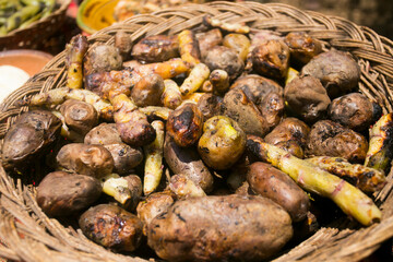 Variety of Peruvian potatoes. In the pachamanca ceremony, lamb, alpaca, pork and beef are cooked. Also variety of tubers and vegetables. All under hot stones and covered with earth.