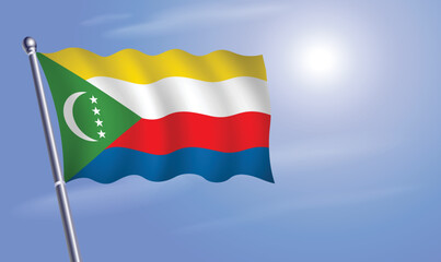Comoros flag against a blue sky