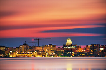 Long Exposure of the Madison skyline reflected in the waters of Lake Monona. Madison, 