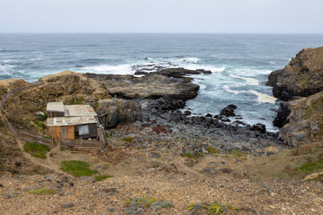 Shack at the rough coast of Pichilemu, Chile 