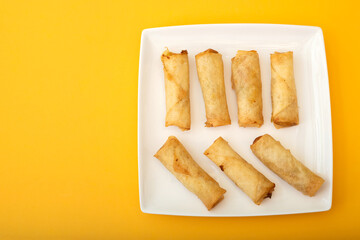 Spring Roll also known as Egg Roll on white dish