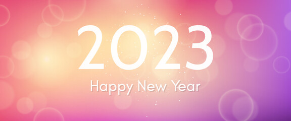 Happy new year 2023 incription on blurred background