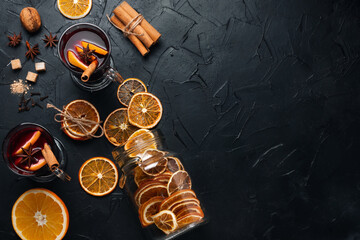 Mulled wine recipe ingredients on black chalkboard with text space - christmas or winter warming...