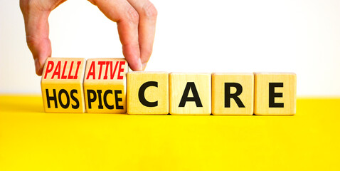 Palliative or hospice care symbol. Concept word Palliative care Hospice care on wooden cubes....